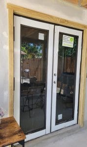 Double white impact door
